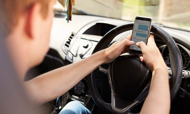 Blanket ban on mobile phone use while driving closes legal loophole