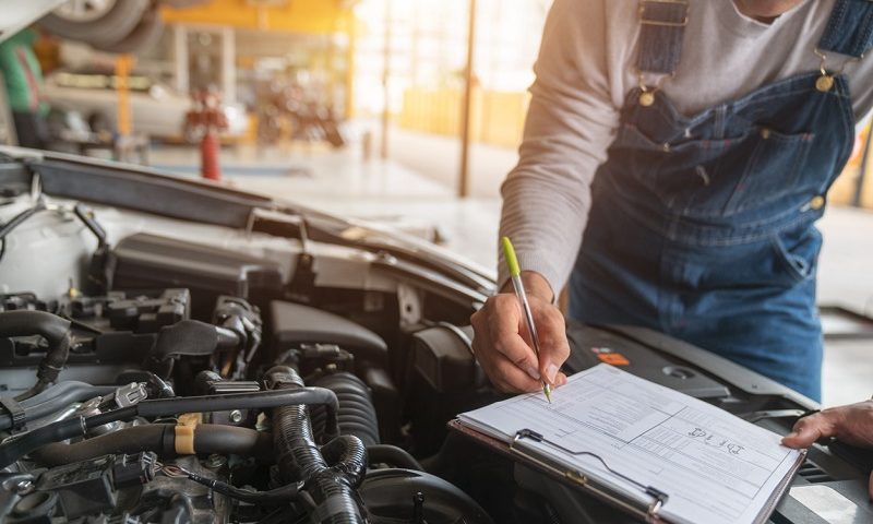 A mechanic works in a garage