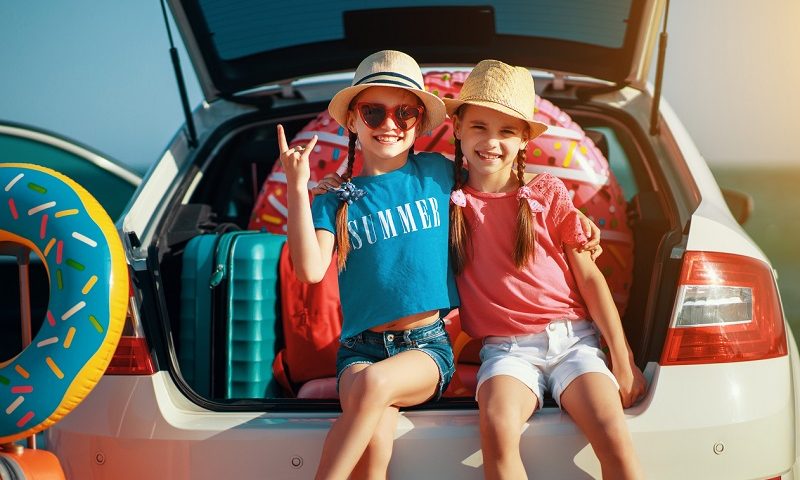 Children on a summer road trip