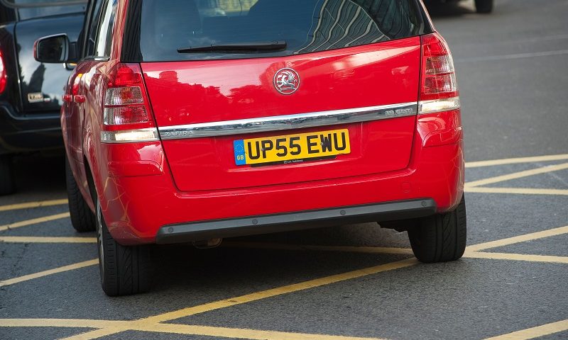 Car stopped in yellow box junction