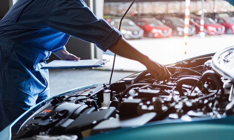 Mechanic doing essential car check