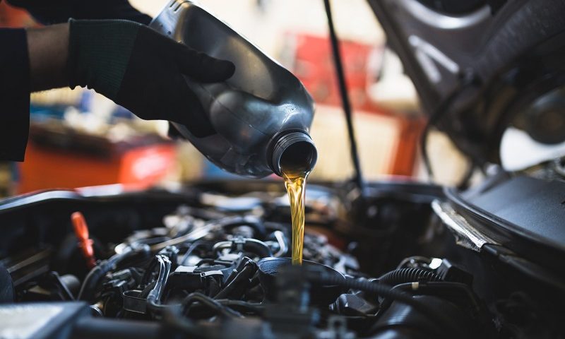 Mechanic doing car service and maintenance