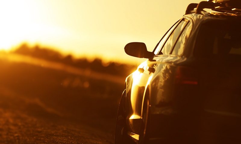 Car parked up during sunset.