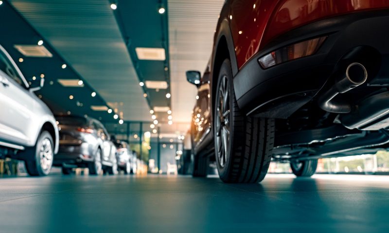 Cars in a car dealership.