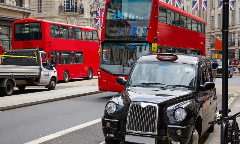 London bus and taxi on Regent Street in London.